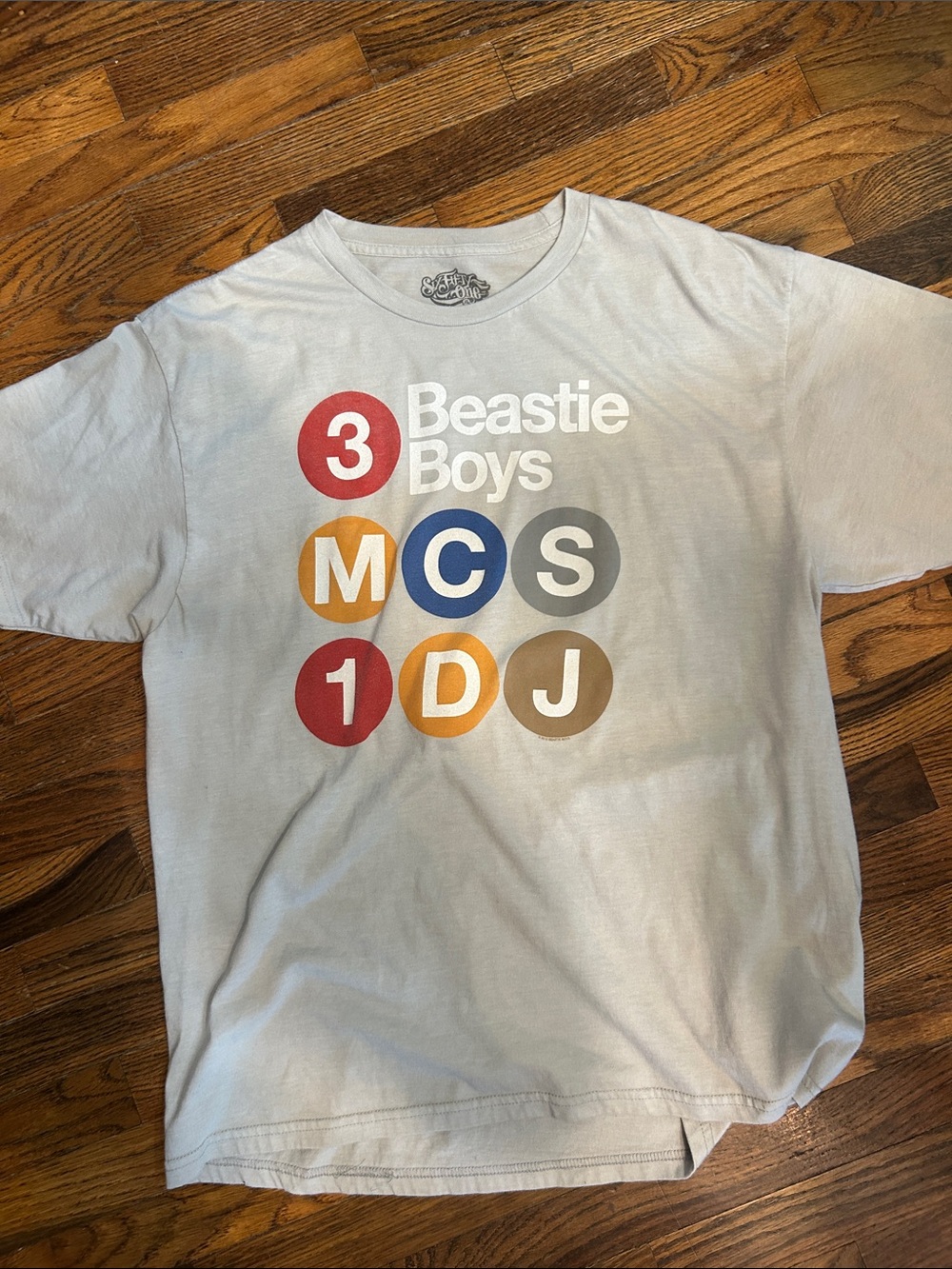 Beastie Boys Graphic Tee in Light Gray with Red Blue Gold Accents